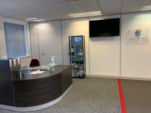 Reception area with a one-way floor marking