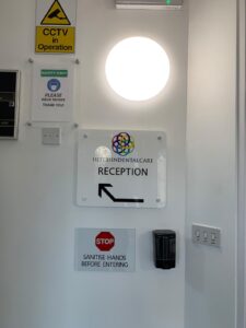 Reception sign and safety notices on the landing