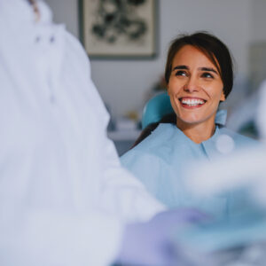 Smiling patient in the dental chair